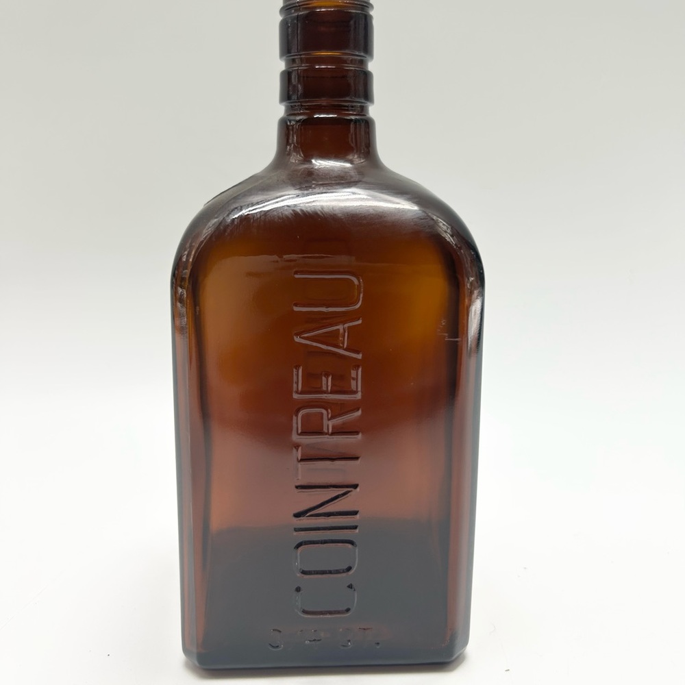 Vintage Cointreau glass bottle.